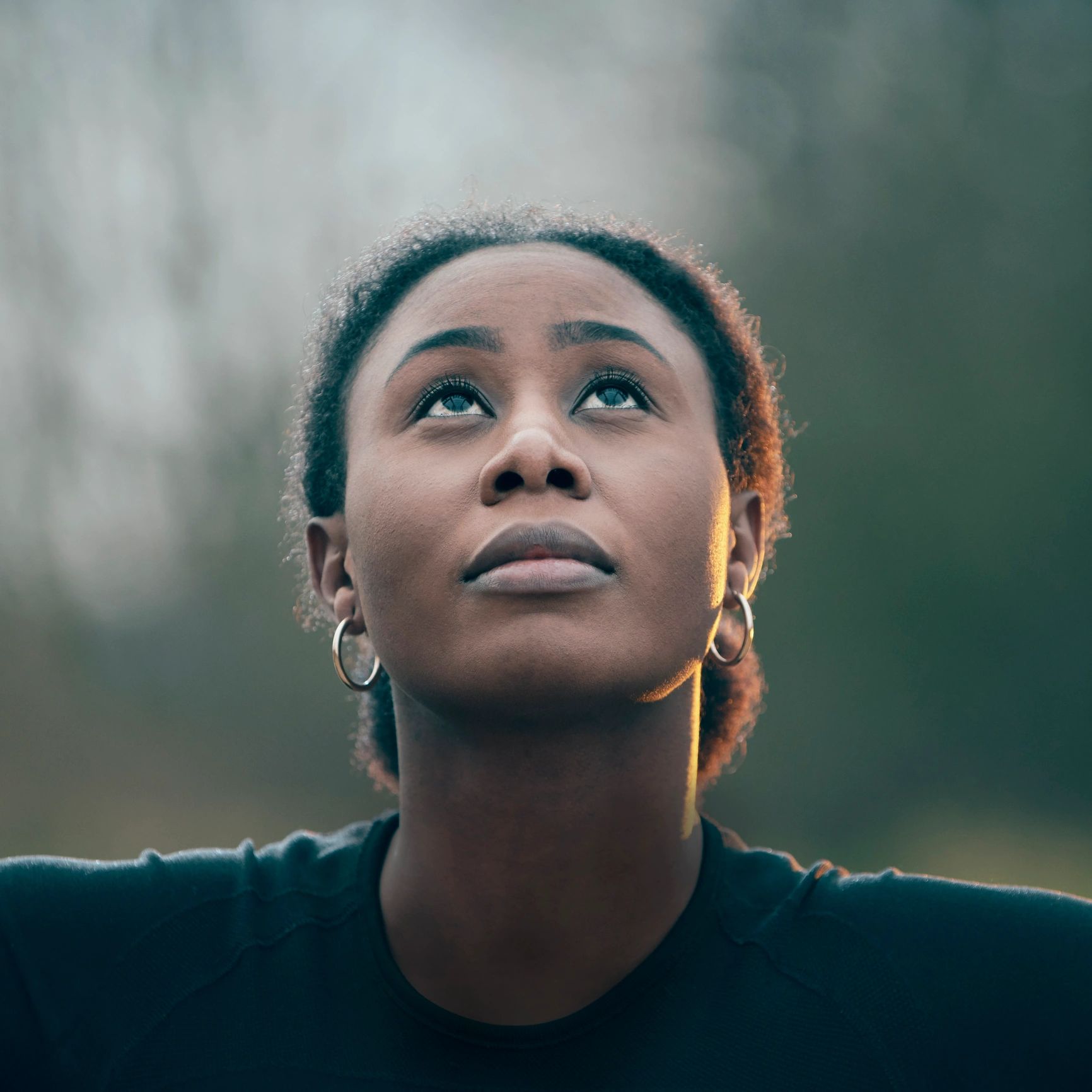 Portrait of a FitCore member with warm orange lighting