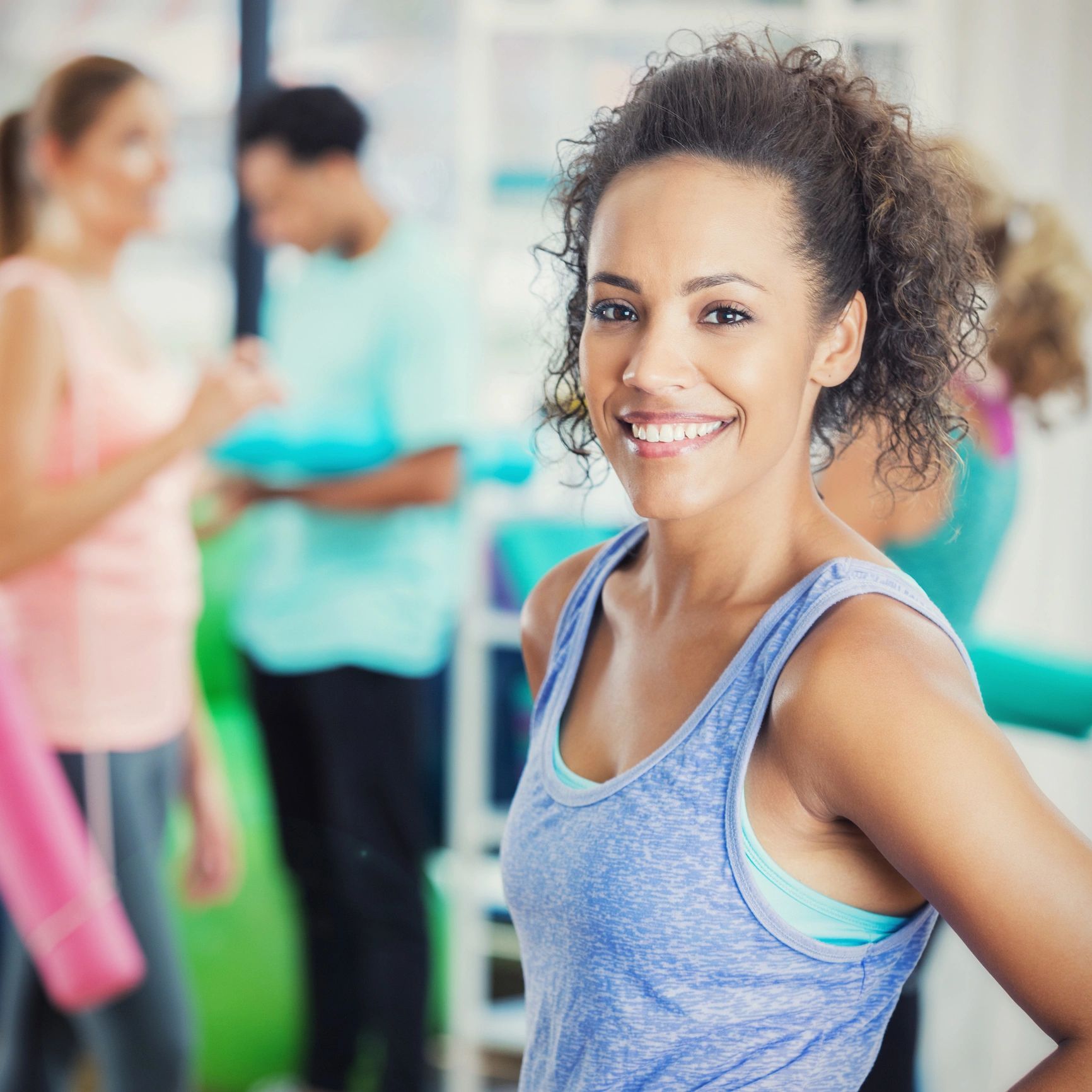 Smiling gym member after a workout